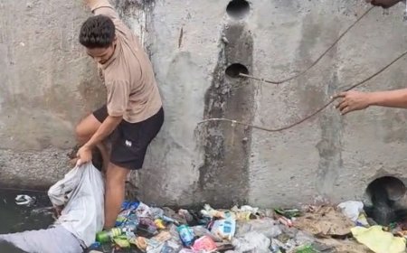 बुलंदशहर के खुर्जा में नाले में गिरा राहगीर, VIDEO:लाखों की सड़क तोड़कर छोड़ी, सुरक्षा दीवार भी नहीं बनाई